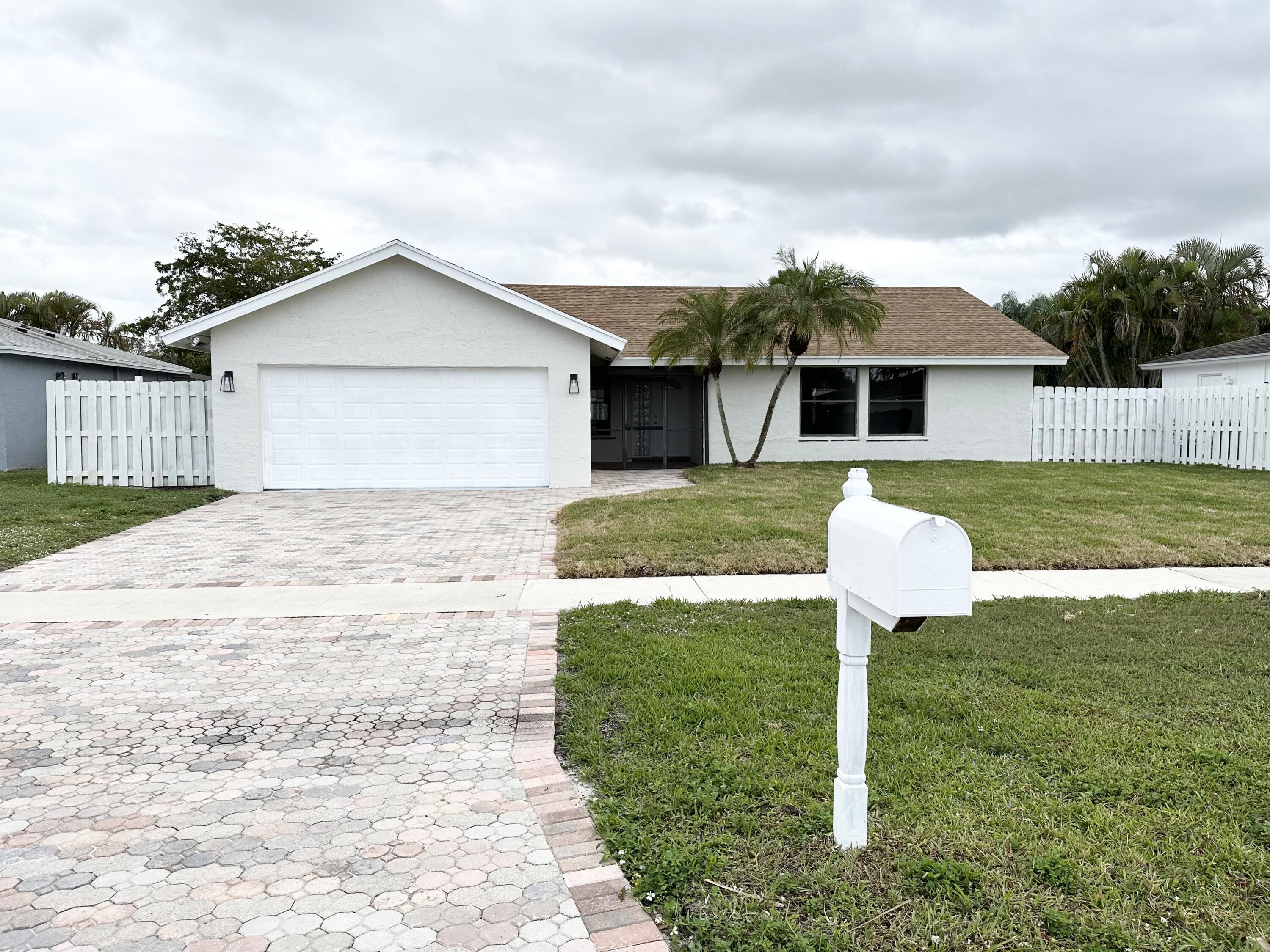 9291 Gettysburg Road Boca Raton, FL 33434 - Photo 1 of 30 Front
