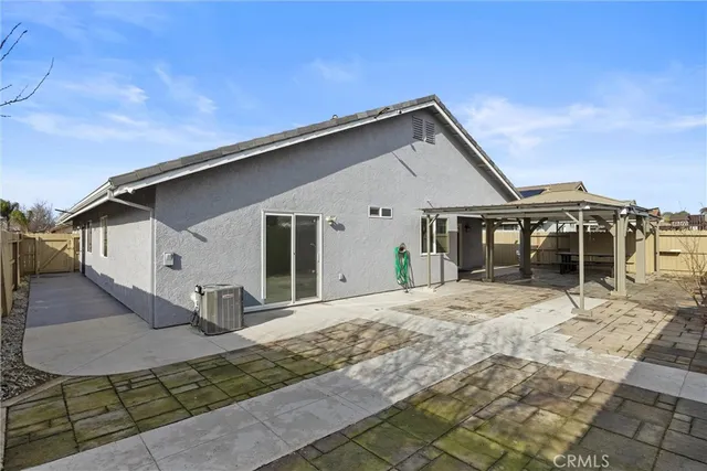 a view of a house with a patio