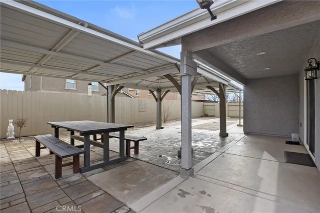 a view of a porch with furniture