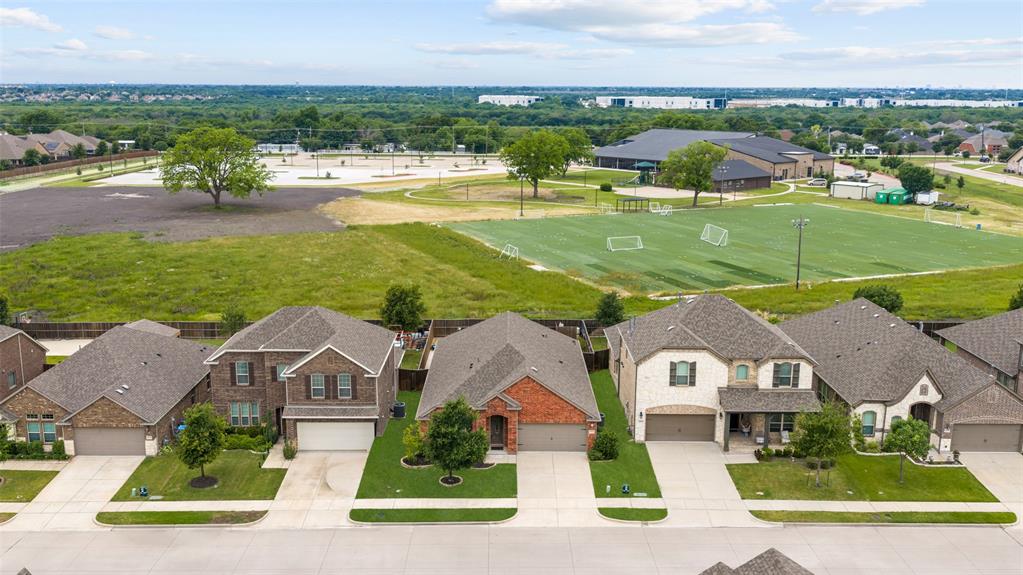 6909 Danridge Road Rowlett, TX 75089 - Photo 27 of 29 an aerial view of residential houses with outdoor space and ocean view