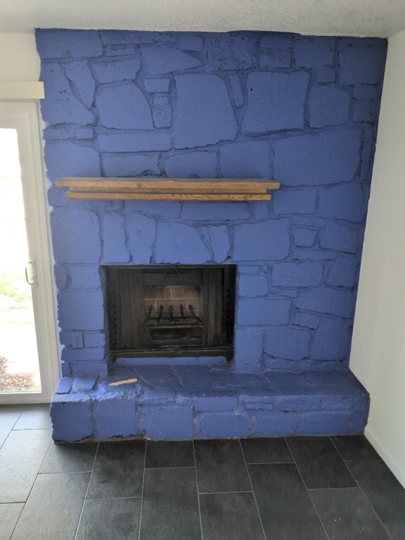 3413 Lynridge Drive, Unit B Austin, TX 78723 - Photo 5 of 23 a fireplace with a wooden floor