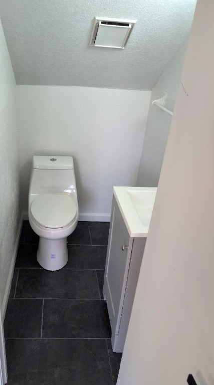 3413 Lynridge Drive, Unit B Austin, TX 78723 - Photo 7 of 23 a bathroom with a toilet and a sink