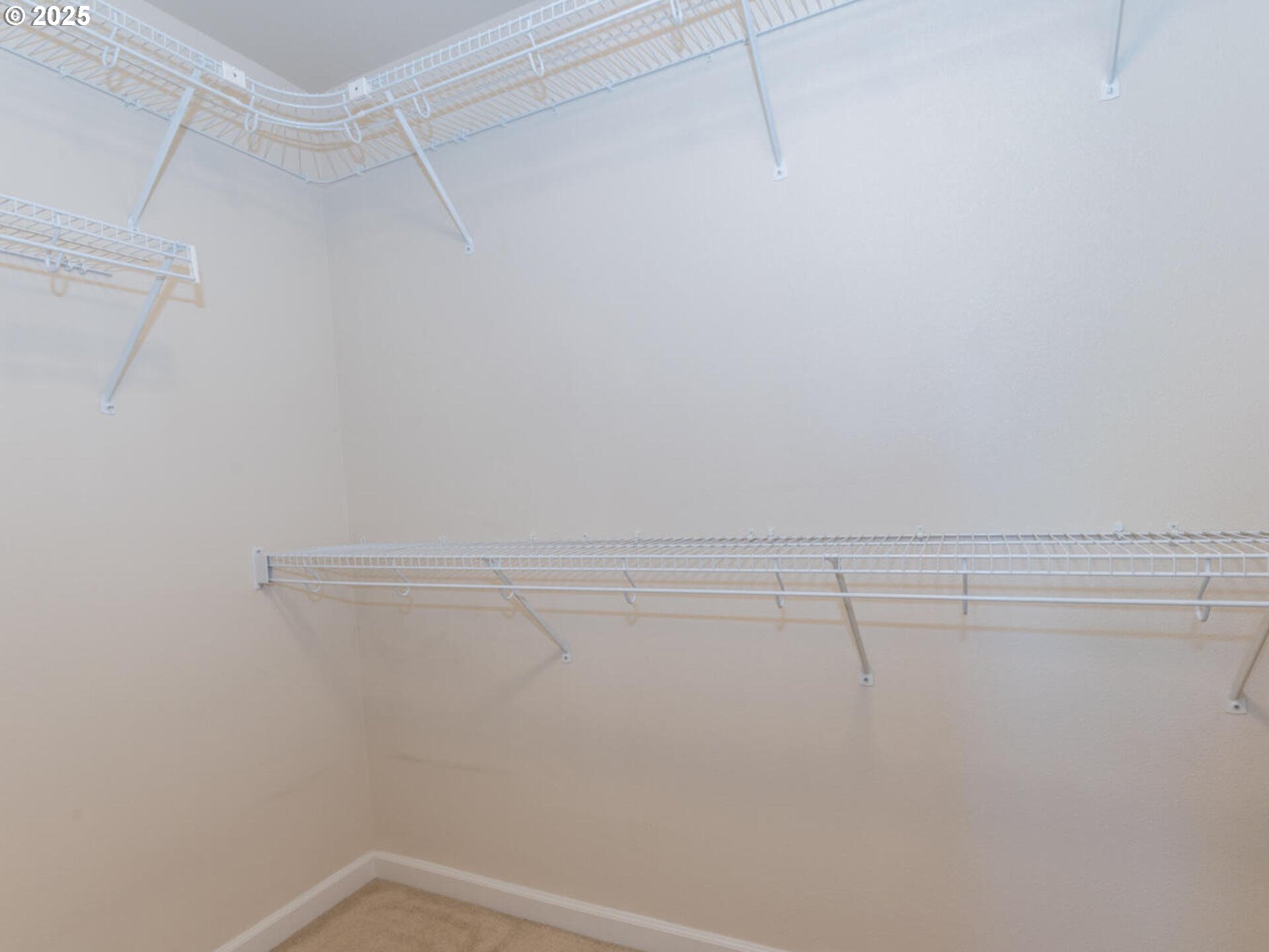 4556 Southwest 11th Street Gresham, OR 97080 - Photo 18 of 31 a view of a room with racks on the wall