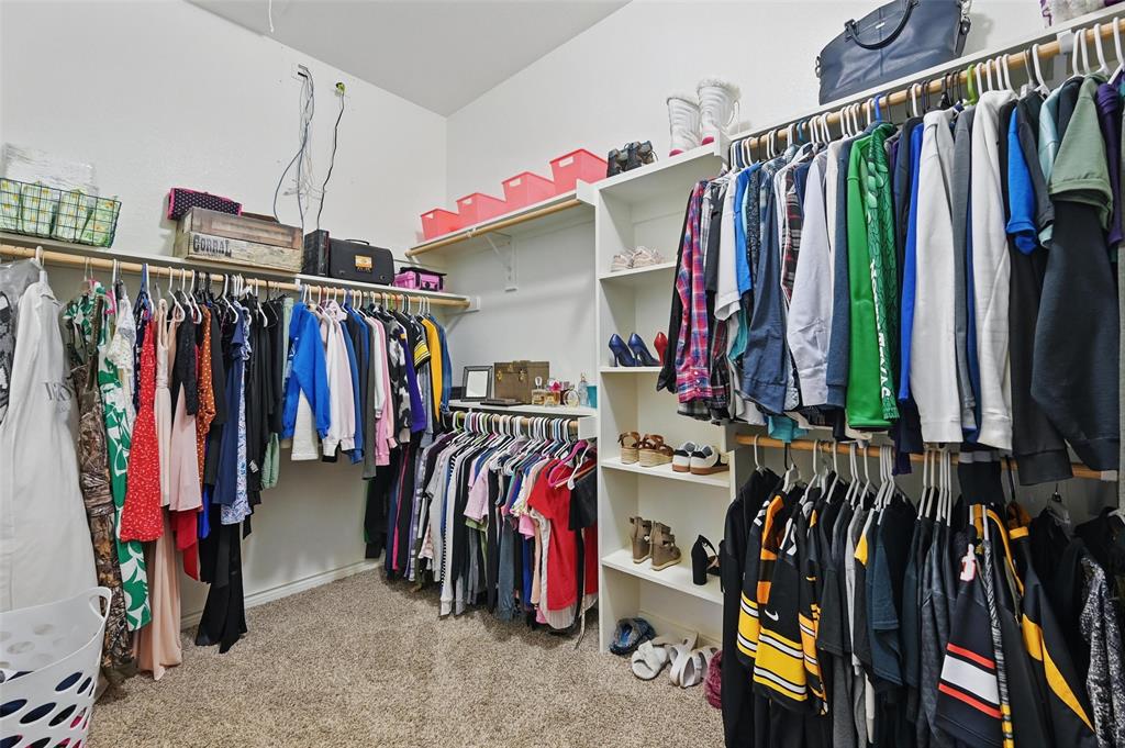 408 Mission Drive Forney, TX 75126 - Photo 19 of 40 Spacious closet featuring carpet