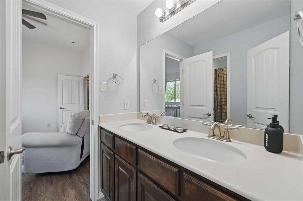 408 Mission Drive Forney, TX 75126 - Photo 26 of 40 Full bath featuring double vanity, wood finished floors, and ceiling fan