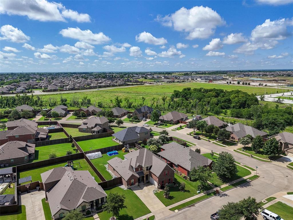 408 Mission Drive Forney, TX 75126 - Photo 34 of 40 Aerial perspective of suburban area