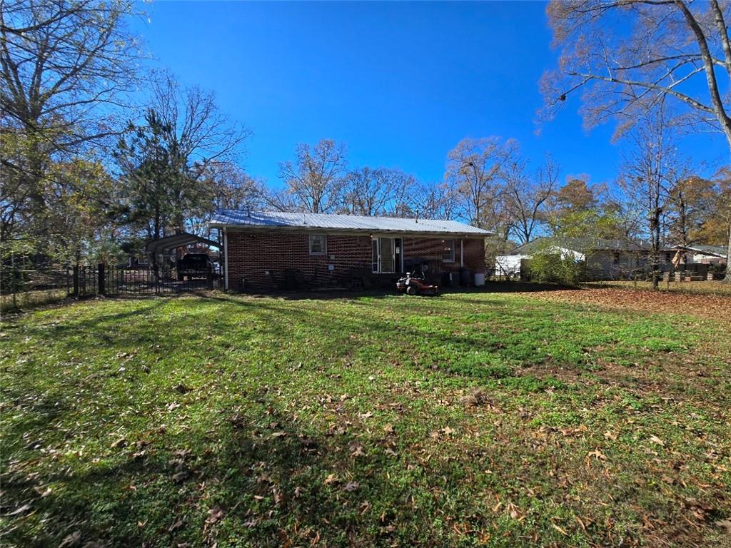 130 Trentwood Place Northwest Rome, GA 30165 - Photo 15 of 15 a view of a house with a yard