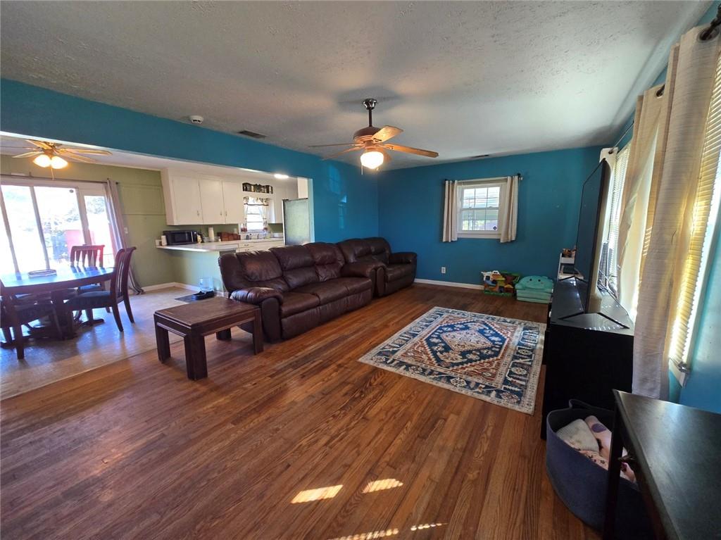 130 Trentwood Place Northwest Rome, GA 30165 - Photo 2 of 15 a living room with furniture and a window