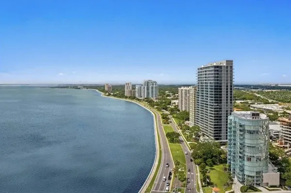 a view of a city with tall buildings