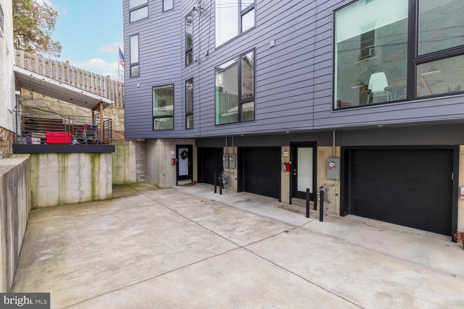 237 Krams Avenue Philadelphia, PA 19128 - Photo 26 of 31 a view of a building with car parked