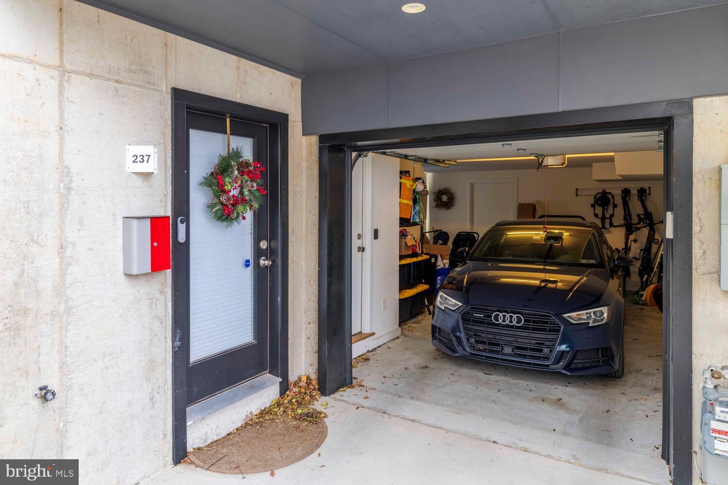 237 Krams Avenue Philadelphia, PA 19128 - Photo 27 of 31 a car parked in a garage