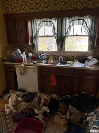 a room with furniture and window