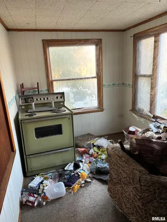 a bed room with two beds and a window