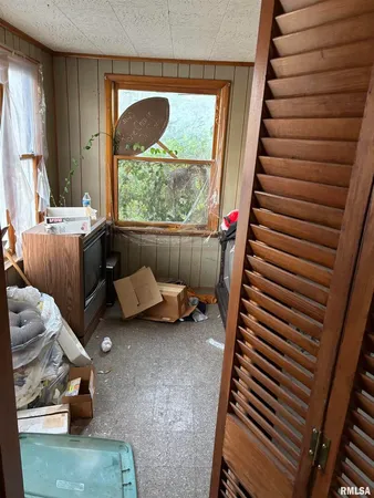 a room with furniture and window