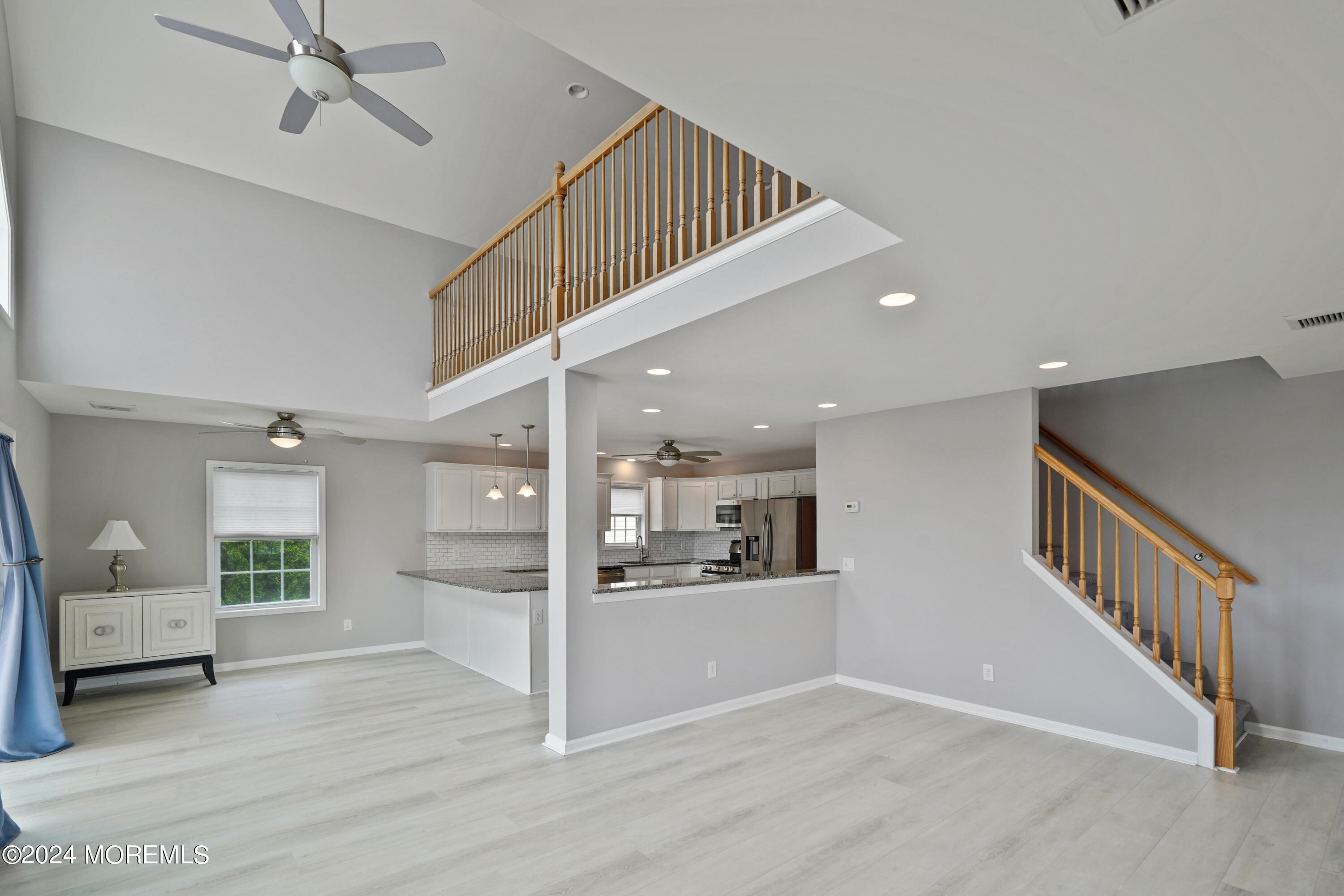 2 Topsail Road Brick, NJ 08723 - Photo 14 of 69 a view of a livingroom with kitchen and furniture