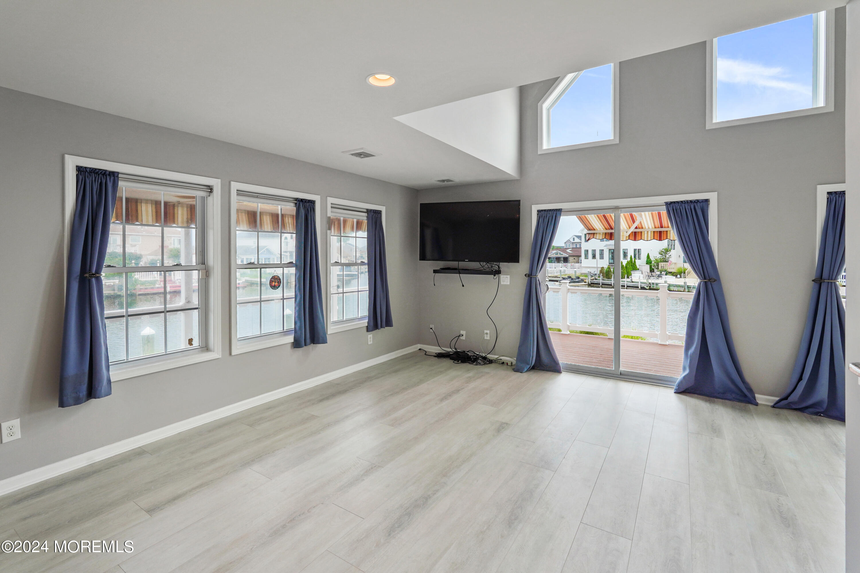 2 Topsail Road Brick, NJ 08723 - Photo 15 of 69 an empty room with windows and fireplace