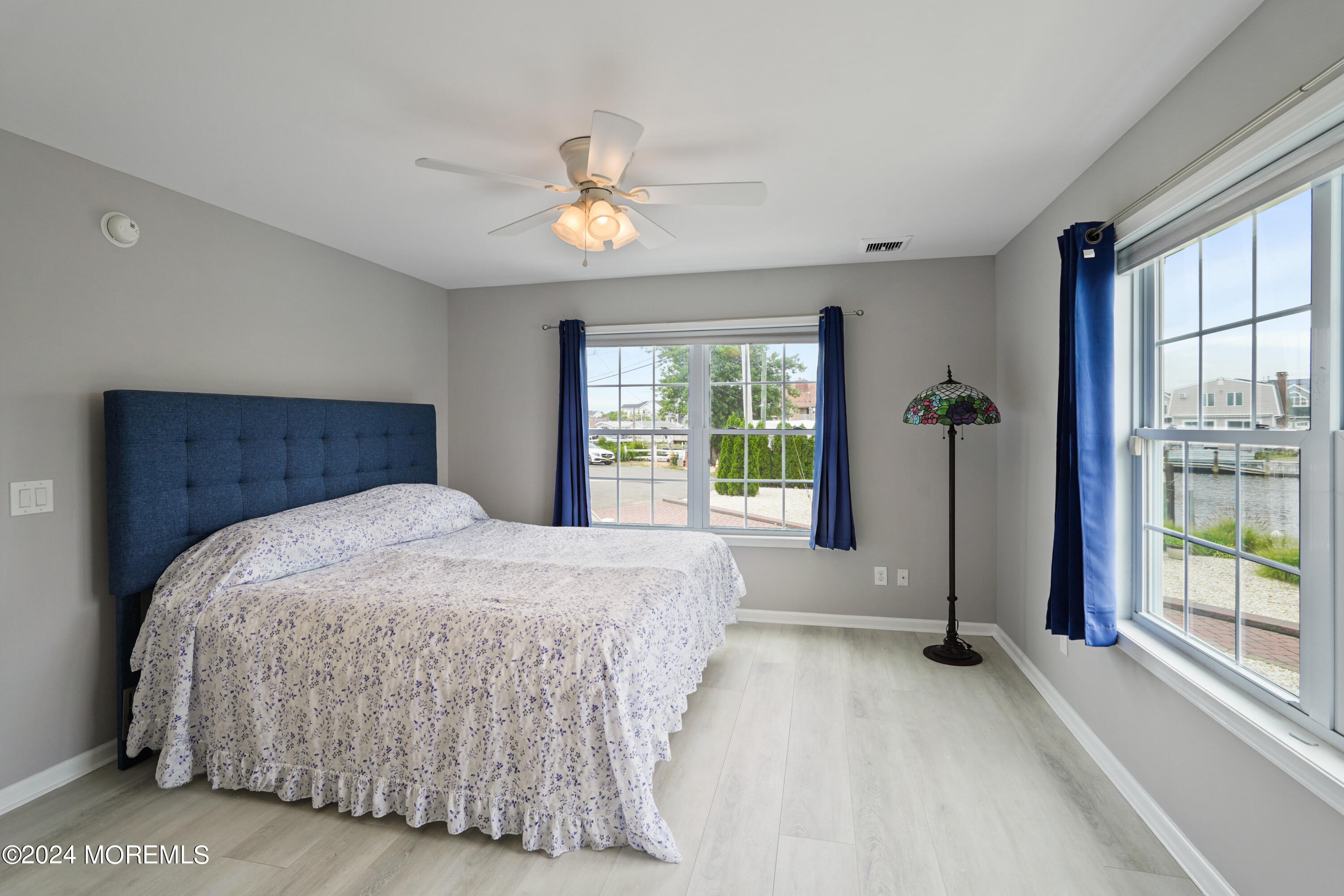 2 Topsail Road Brick, NJ 08723 - Photo 16 of 69 a bedroom with a large bed and a large window