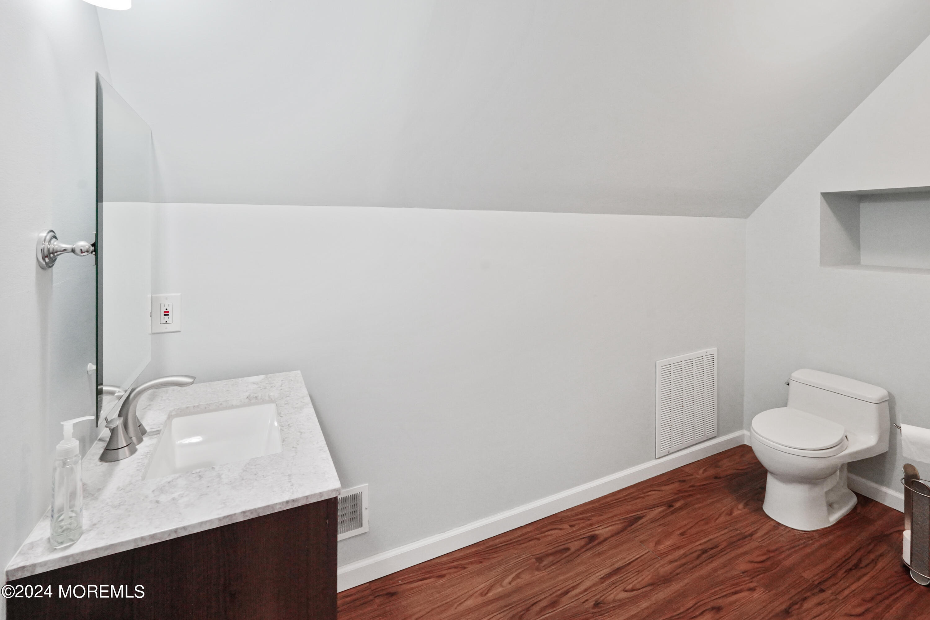 2 Topsail Road Brick, NJ 08723 - Photo 28 of 69 a bathroom with a sink and a toilet