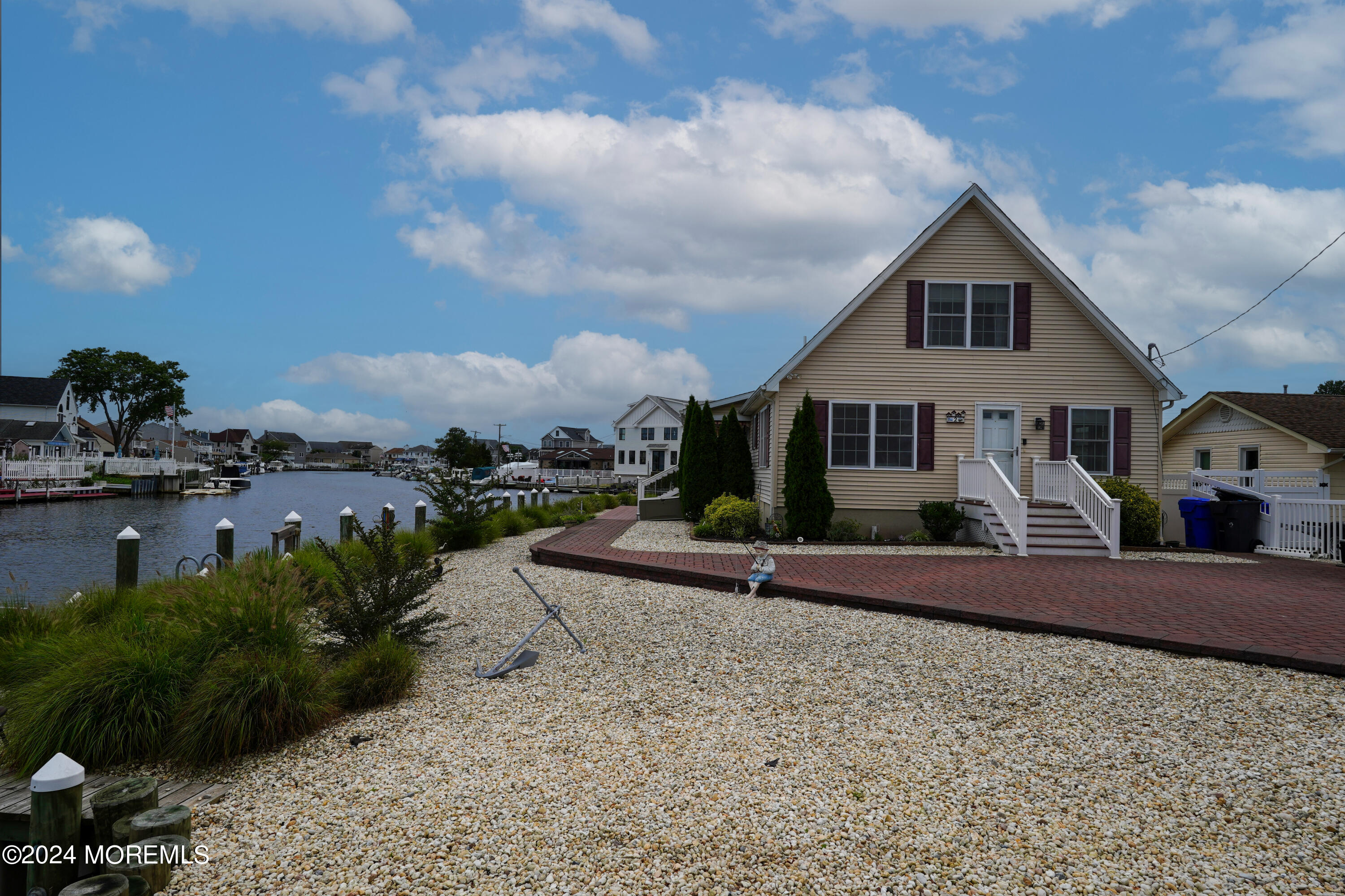 2 Topsail Road Brick, NJ 08723 - Photo 37 of 69 a front view of a house with a yard