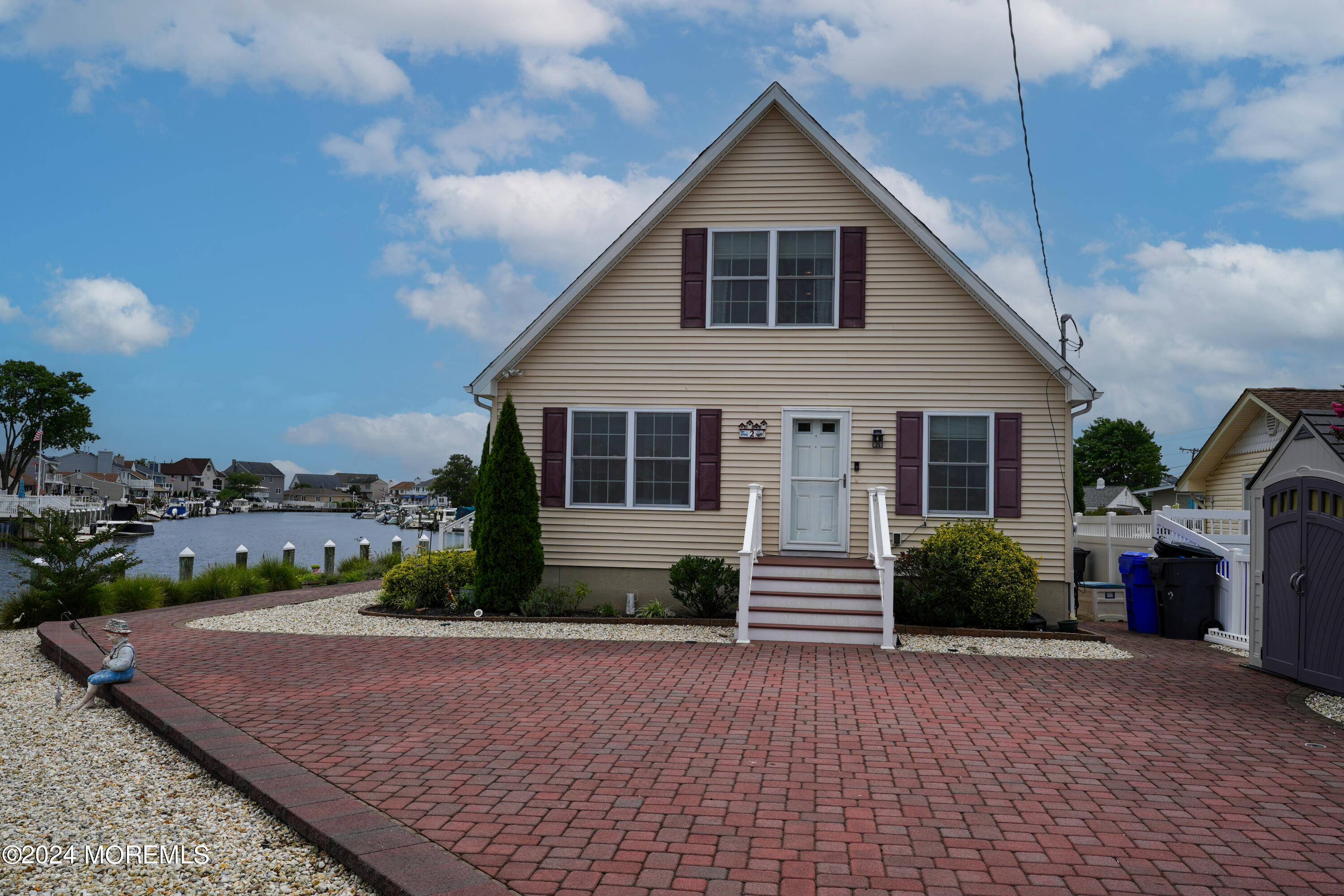 2 Topsail Road Brick, NJ 08723 - Photo 38 of 69 a front view of a house with a yard
