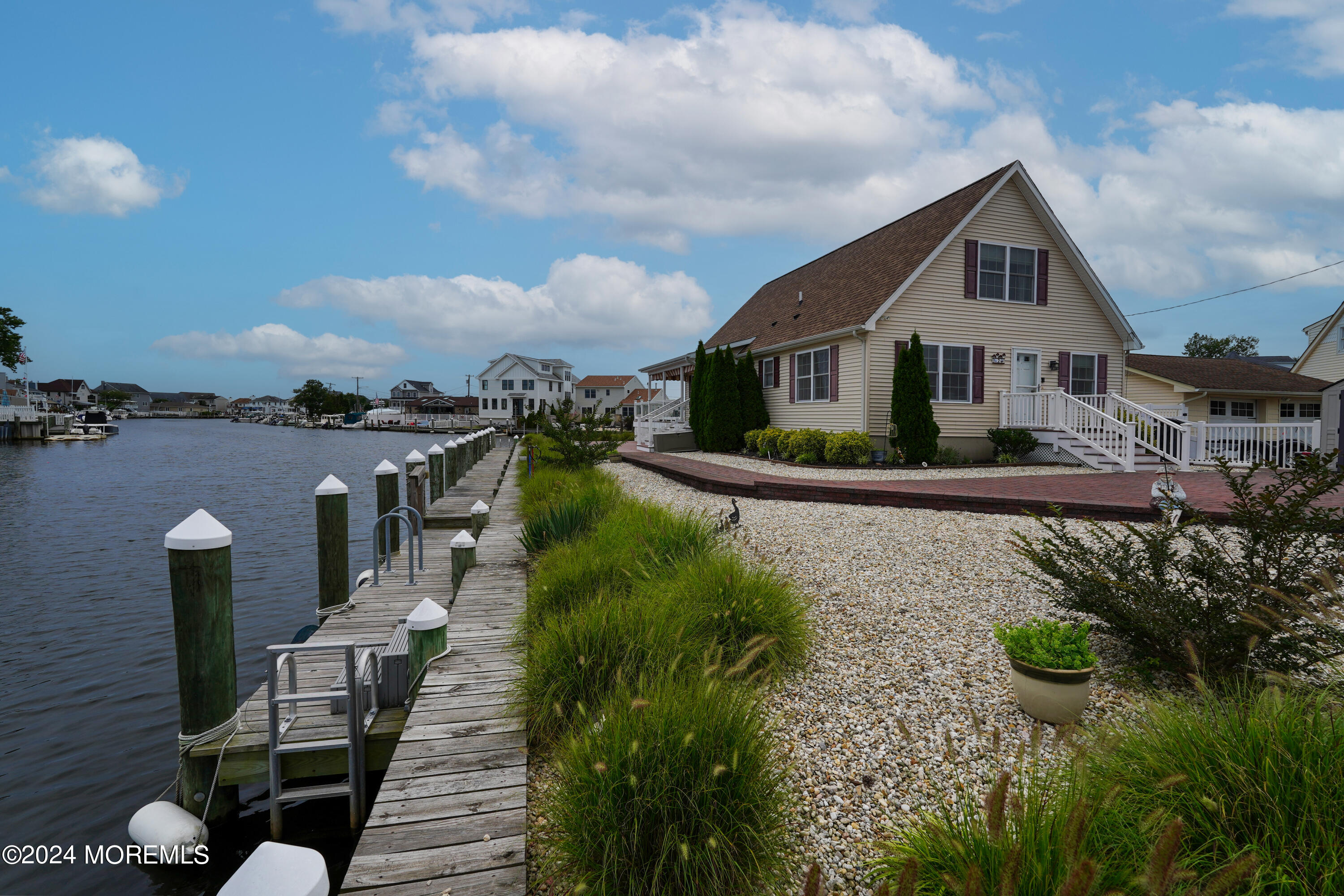 2 Topsail Road Brick, NJ 08723 - Photo 42 of 69 a front view of a house with garden