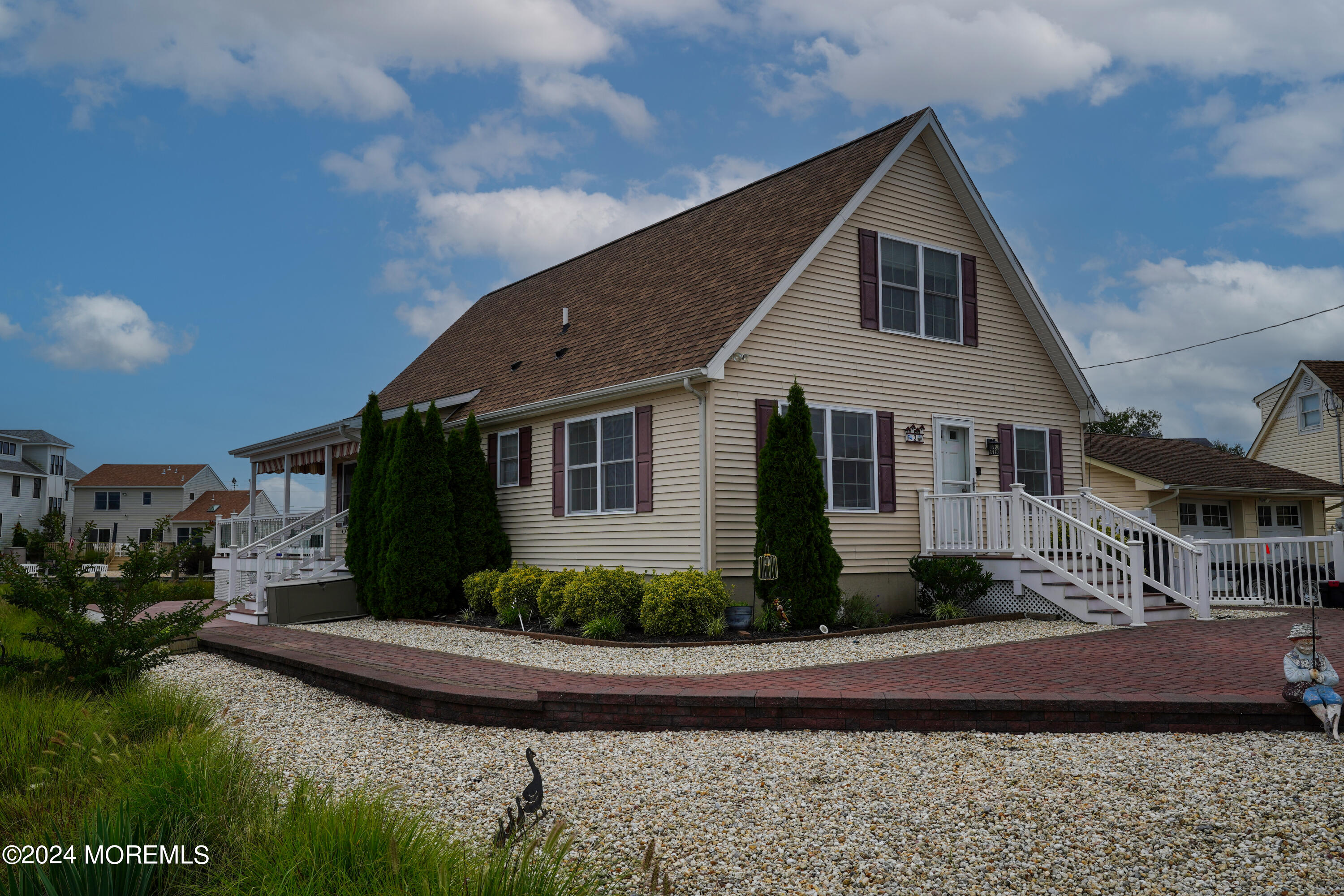 2 Topsail Road Brick, NJ 08723 - Photo 43 of 69 a front view of a house with a yard