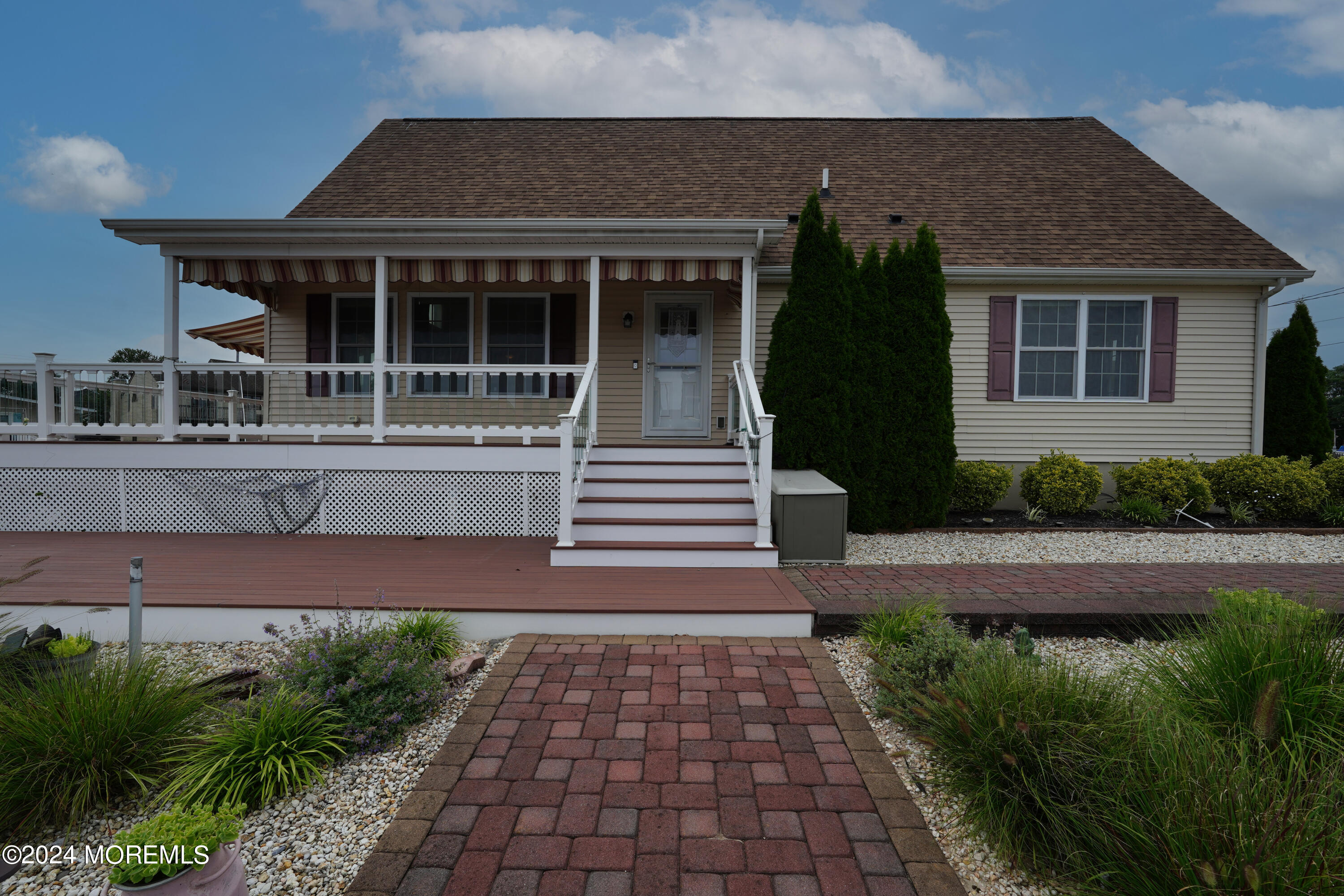 2 Topsail Road Brick, NJ 08723 - Photo 44 of 69 a front view of a house with garden