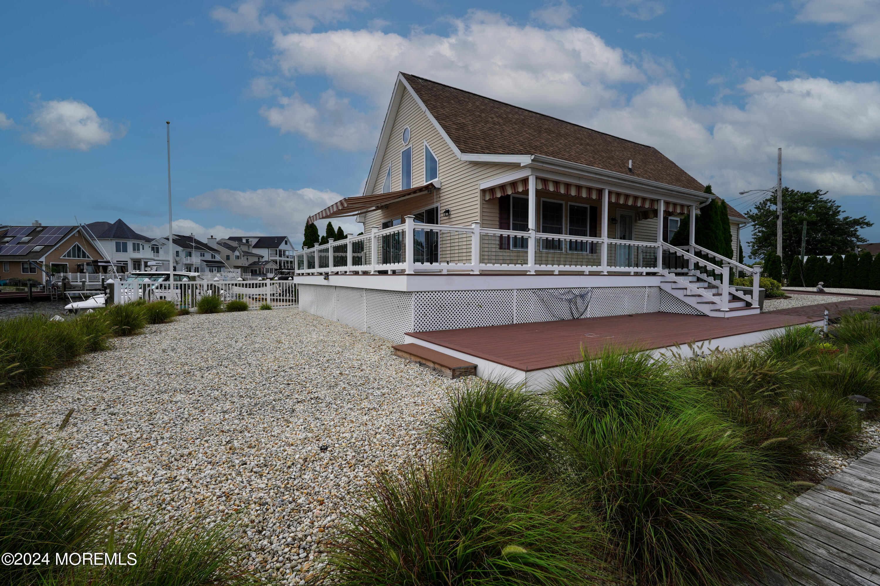 2 Topsail Road Brick, NJ 08723 - Photo 45 of 69 a view of a house with a yard and sitting area