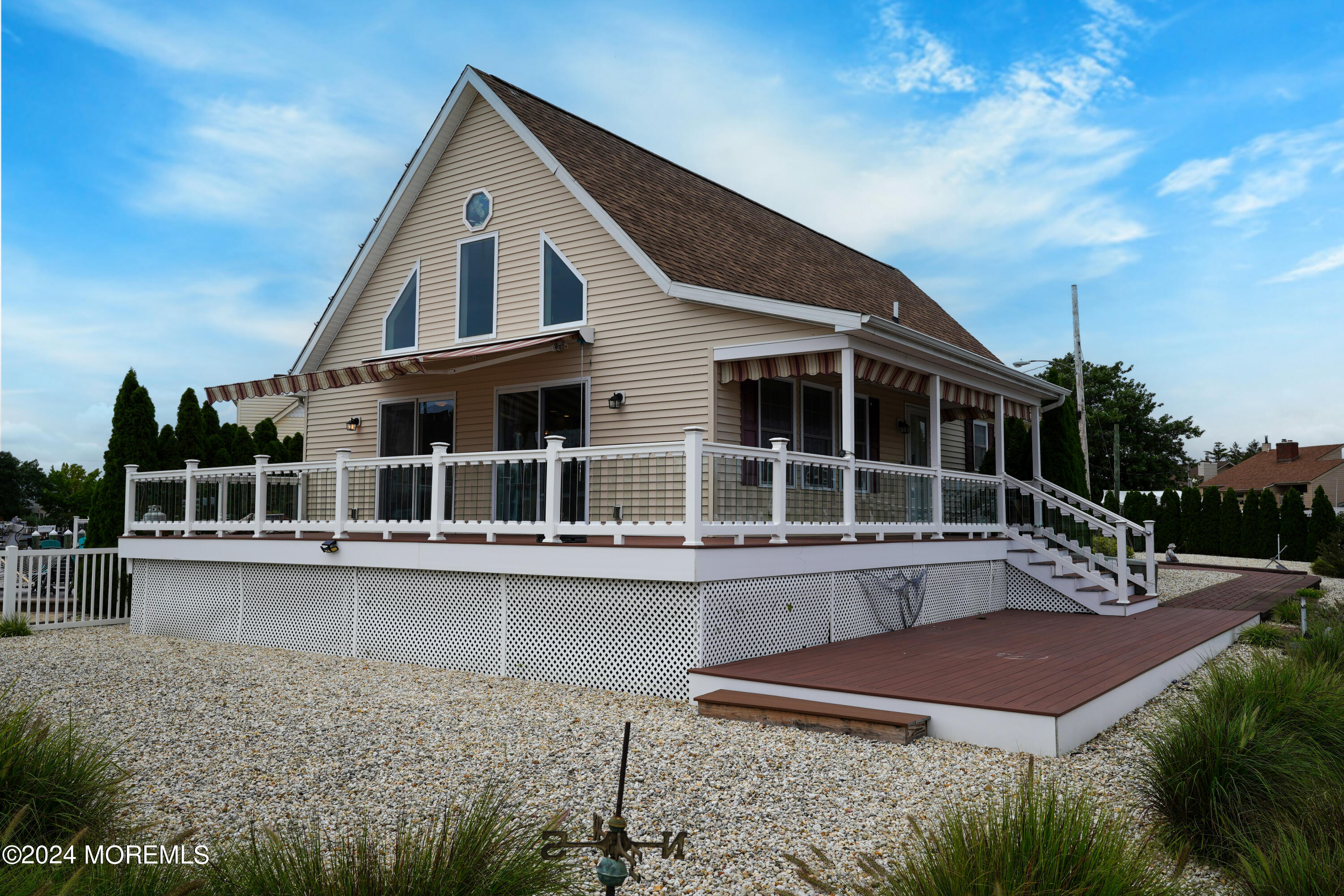 2 Topsail Road Brick, NJ 08723 - Photo 46 of 69 a front view of a house with a yard