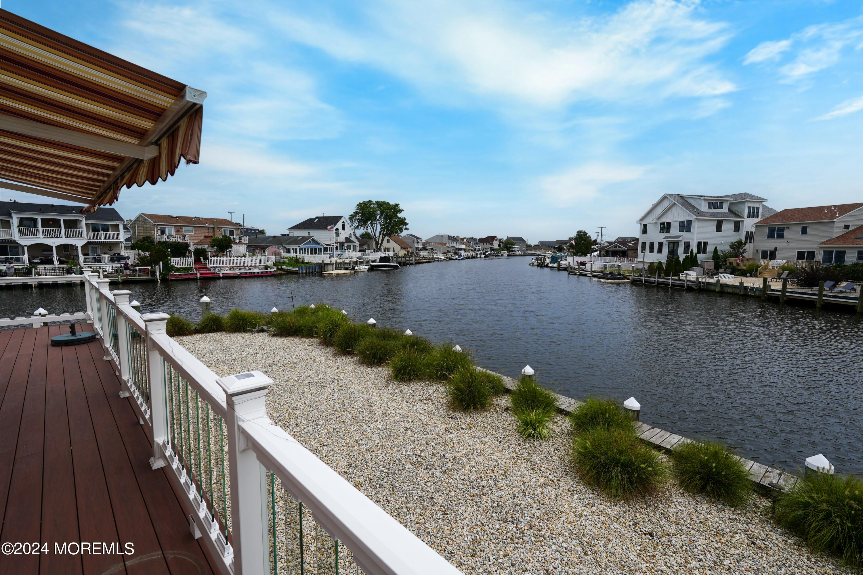 2 Topsail Road Brick, NJ 08723 - Photo 55 of 69 a view of a lake from a balcony