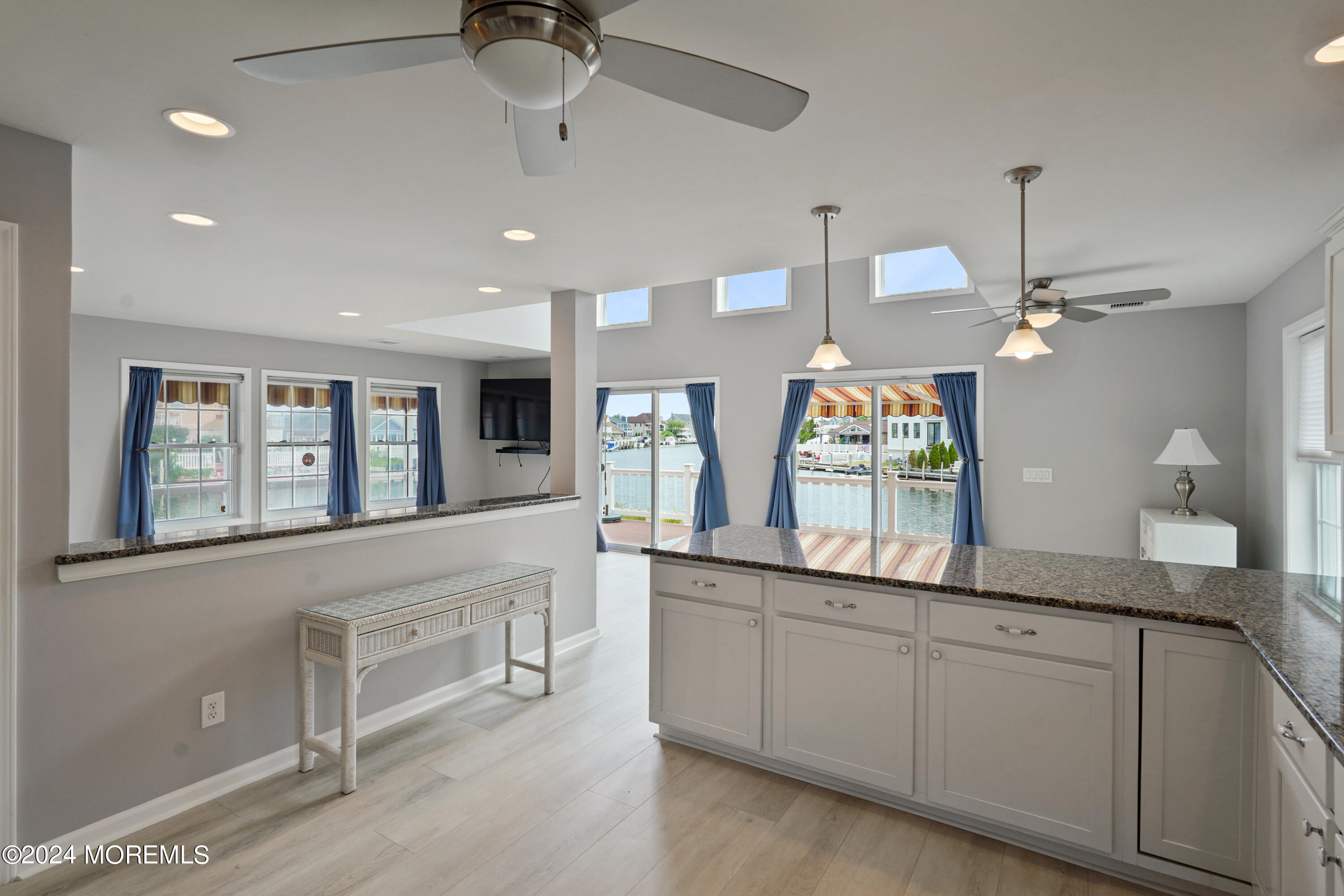 2 Topsail Road Brick, NJ 08723 - Photo 10 of 69 a bathroom with a sink and a large mirror