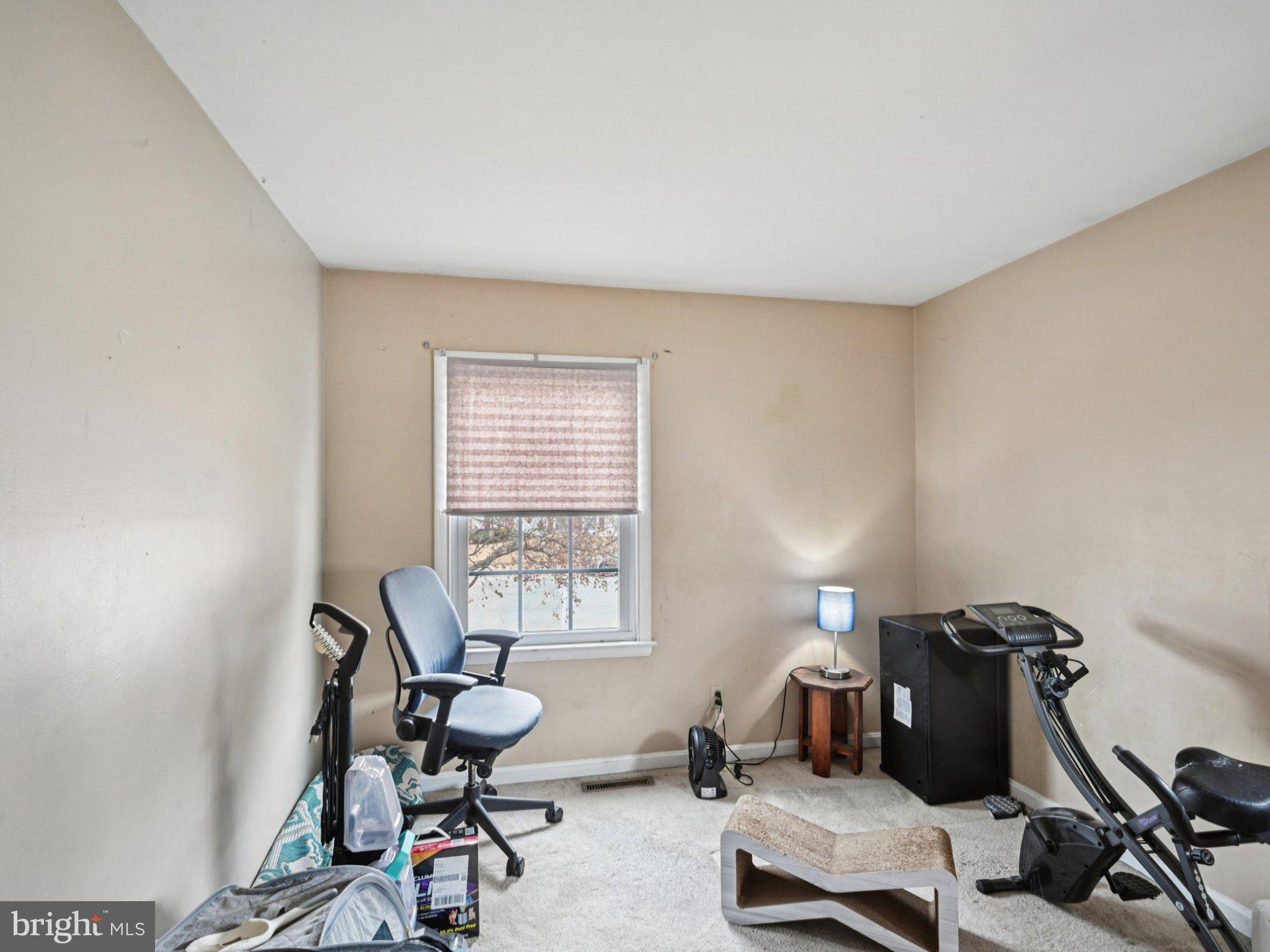 170 Scottfield Drive Newark, DE 19713 - Photo 20 of 28 a view of a workspace with furniture and a window