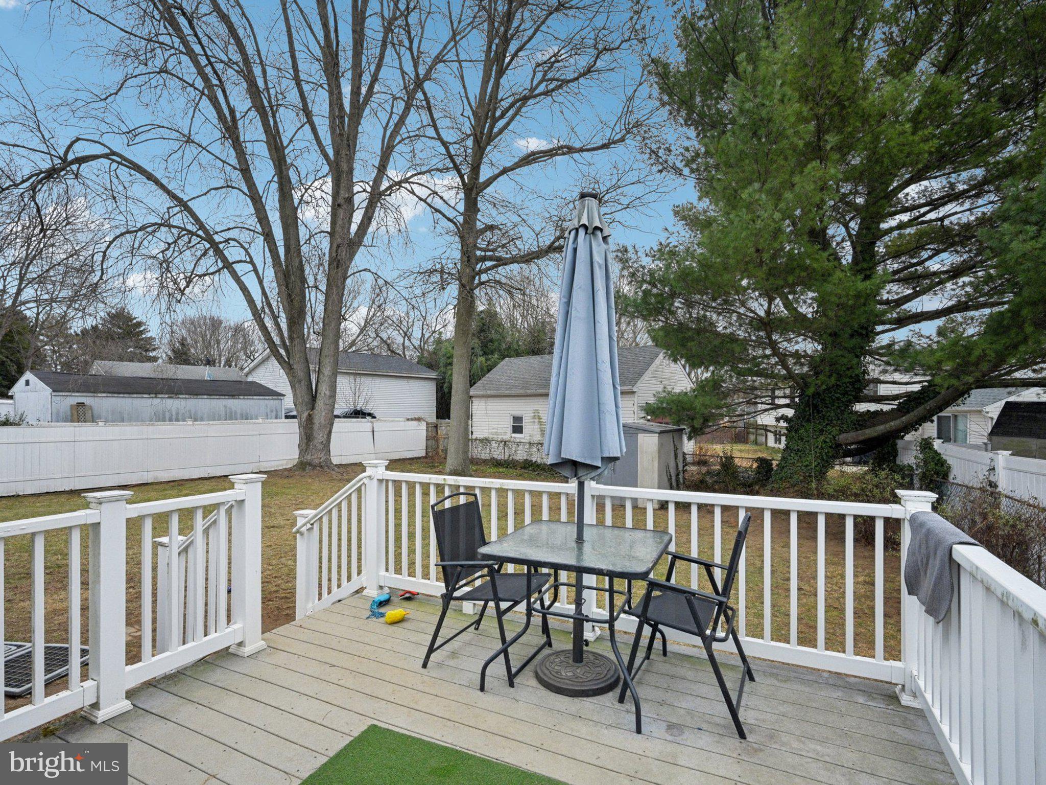 170 Scottfield Drive Newark, DE 19713 - Photo 24 of 28 a view of a wooden chairs and table on the deck