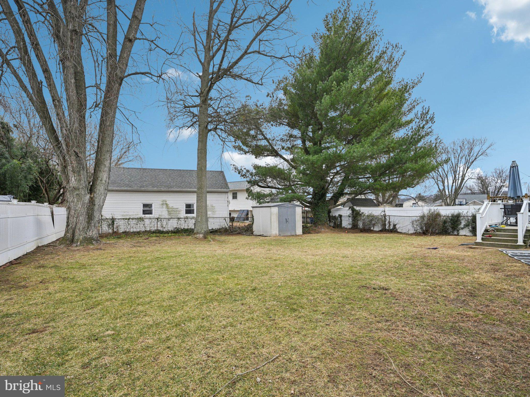 170 Scottfield Drive Newark, DE 19713 - Photo 28 of 28 a front view of a house with a yard and garage