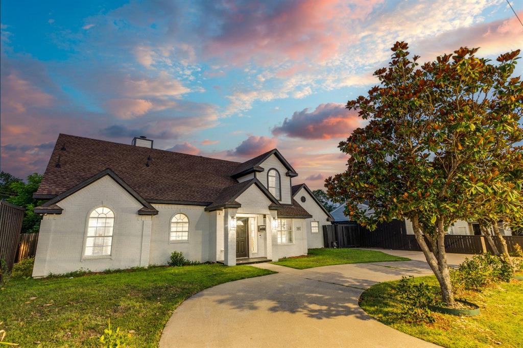 3304 Inwood Road Dallas, TX 75235 - Photo 1 of 24 a front view of a house with a yard