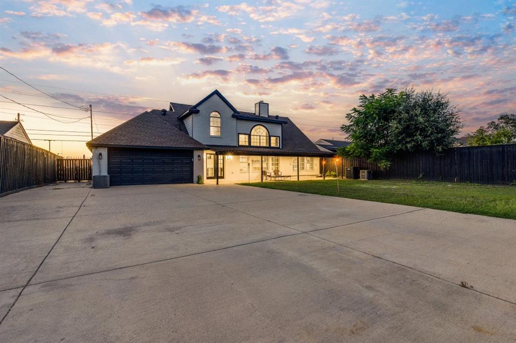 3304 Inwood Road Dallas, TX 75235 - Photo 24 of 24 front view of a house with a yard