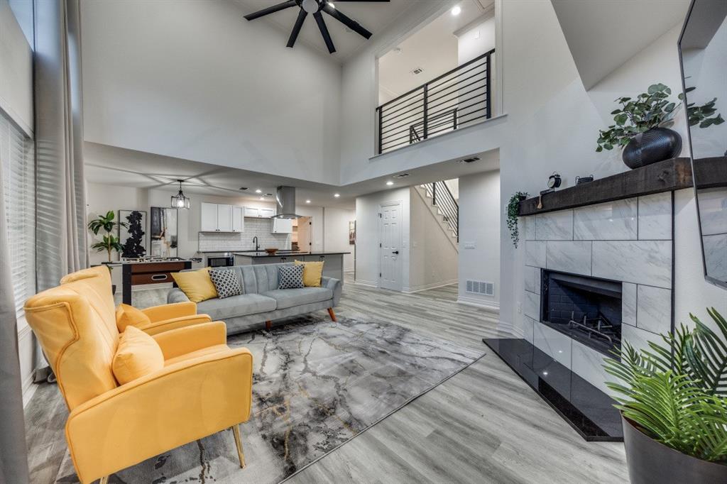 3304 Inwood Road Dallas, TX 75235 - Photo 8 of 24 a living room with furniture and a fireplace