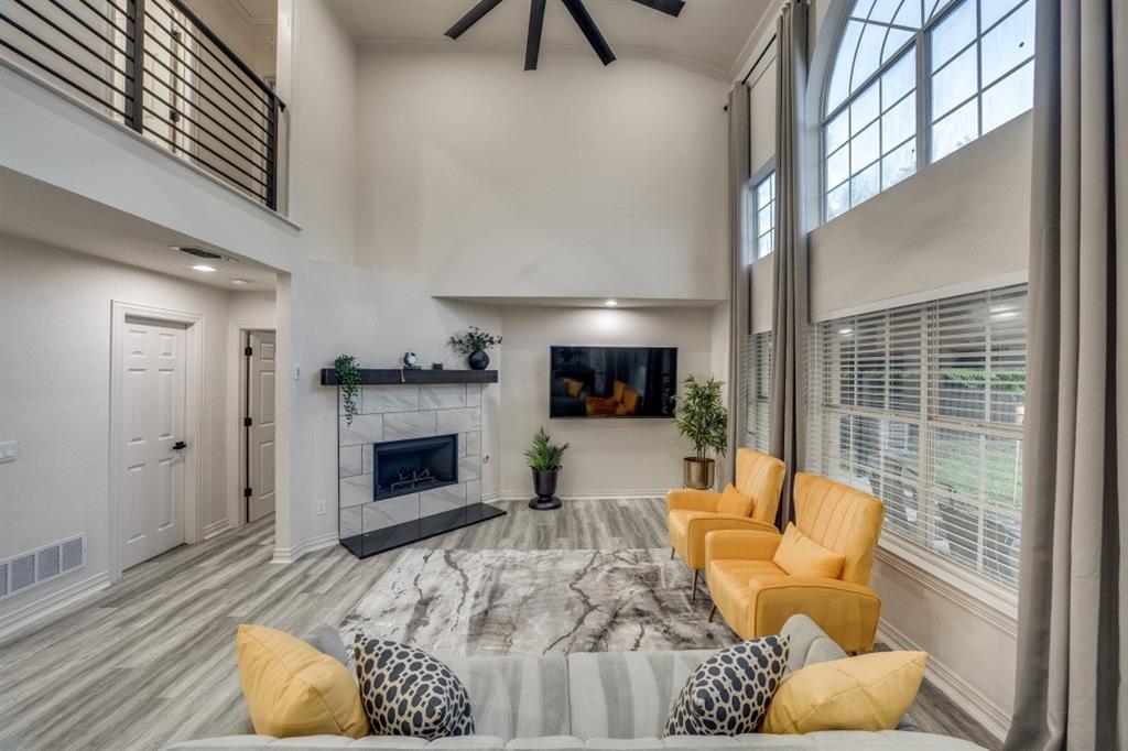 3304 Inwood Road Dallas, TX 75235 - Photo 10 of 24 a living room with furniture and a fireplace