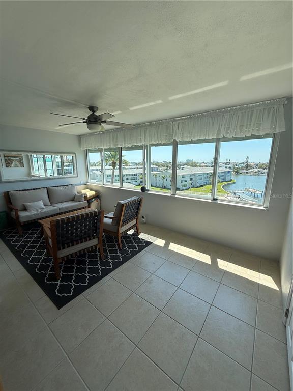 1868 Shore Drive South, Unit 608 South Pasadena, FL 33707 - Photo 10 of 36 a view of a dining room with furniture window and outside view