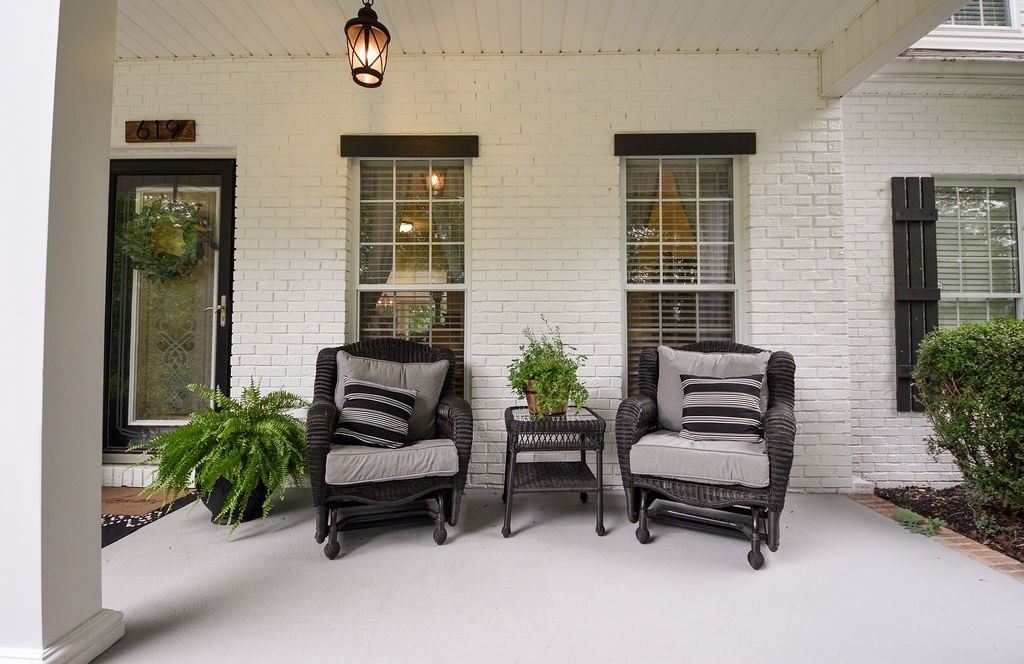 619 Eads Bluff Road Northwest Georgetown, TN 37336 - Photo 9 of 67 a view of a patio with a table and chairs and potted plants