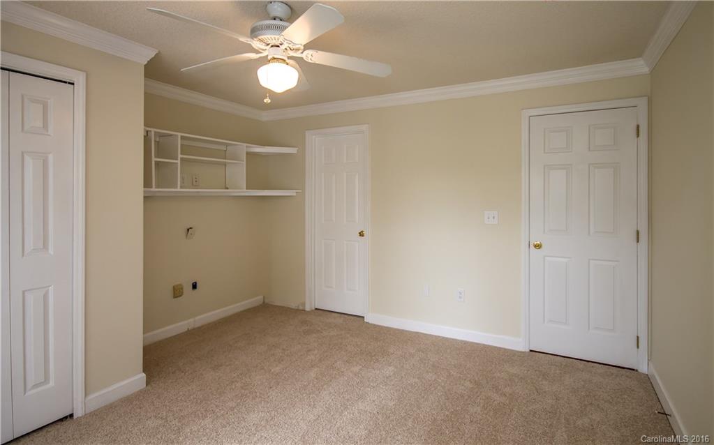 1129 Torrence Circle, Unit 1129 Davidson, NC 28036 - Photo 15 of 20 a view of an empty room with a window