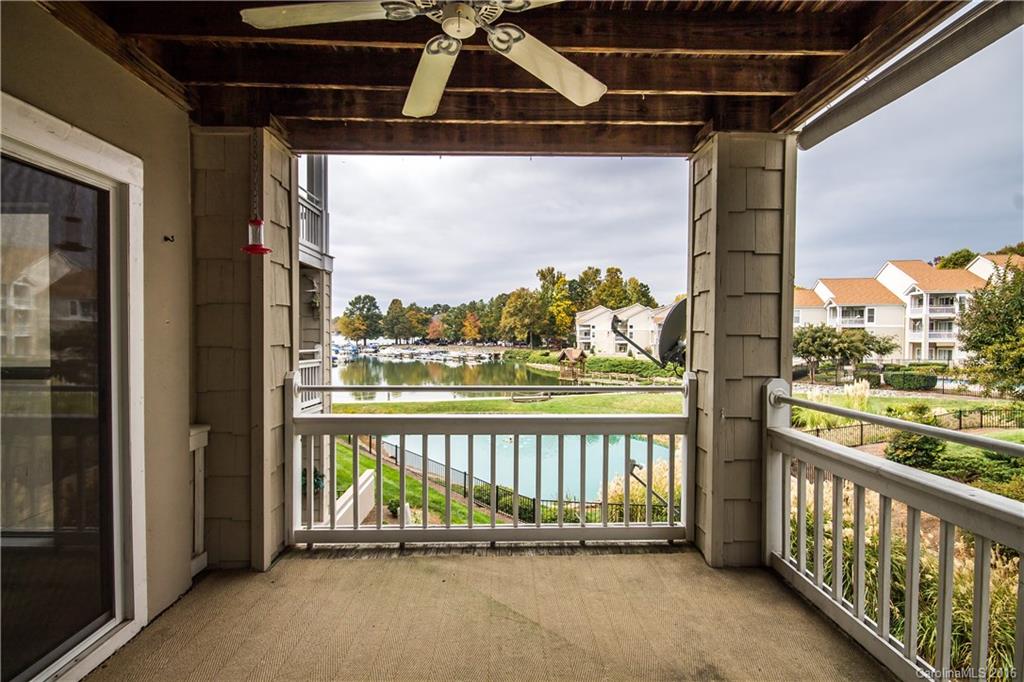 1129 Torrence Circle, Unit 1129 Davidson, NC 28036 - Photo 19 of 20 a view of a balcony with lake view