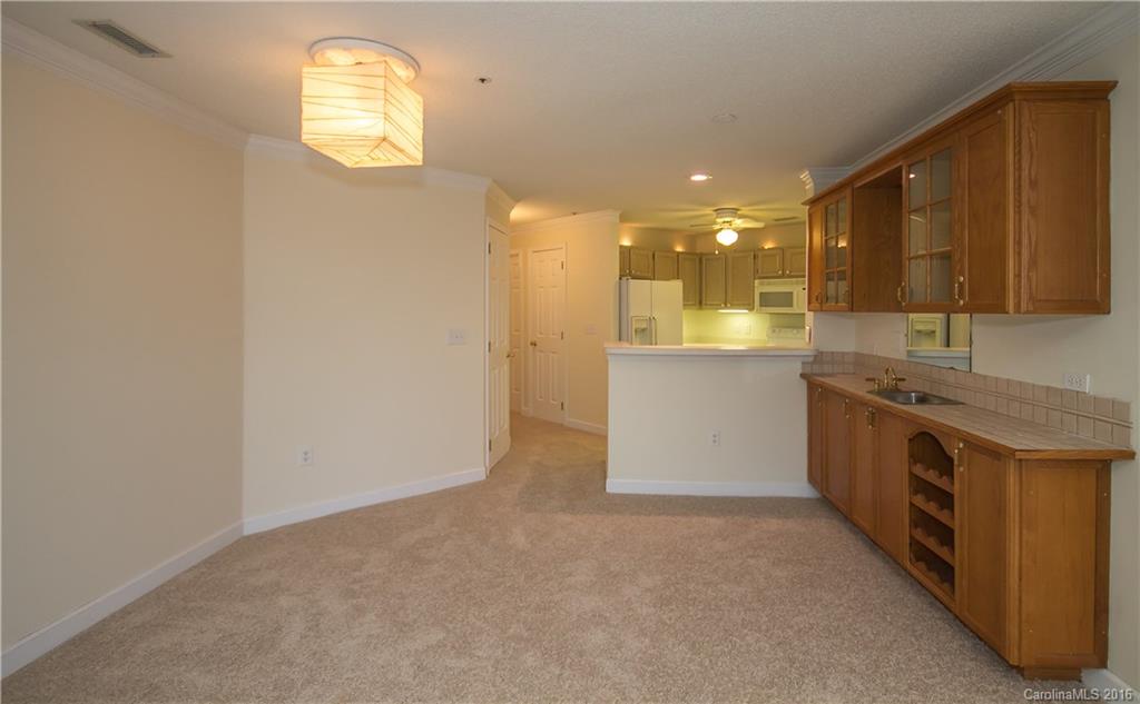 1129 Torrence Circle, Unit 1129 Davidson, NC 28036 - Photo 8 of 20 a view of a kitchen
