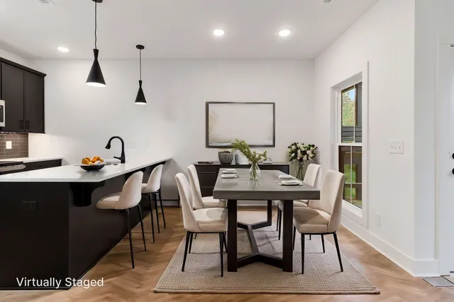 a view of a dining room with furniture