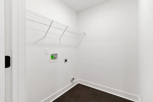 a view of small space with empty racks on the wall