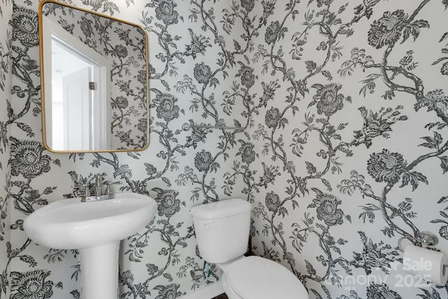 a bathroom with a sink and a toilet