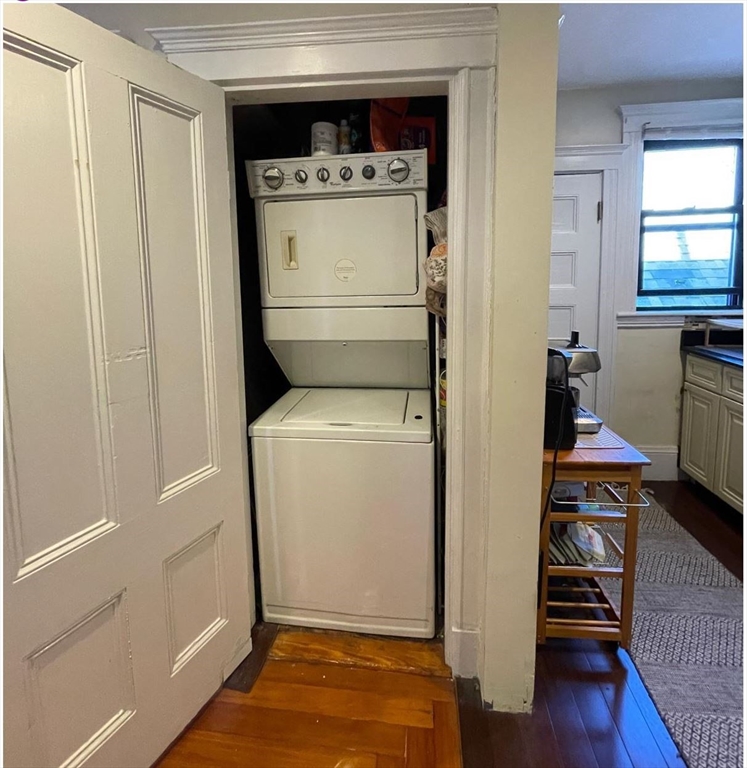 1672 Beacon Street, Unit 3B Brookline, MA 02445 - Photo 6 of 7 a utility room with dryer and washer
