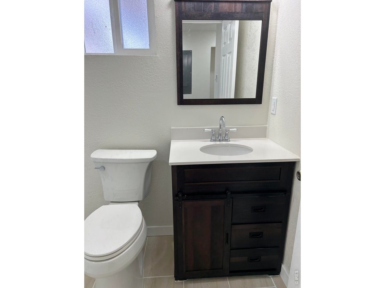 809 Warren Street Weldona, CO 80653 - Photo 13 of 19 a bathroom with a sink and a toilet