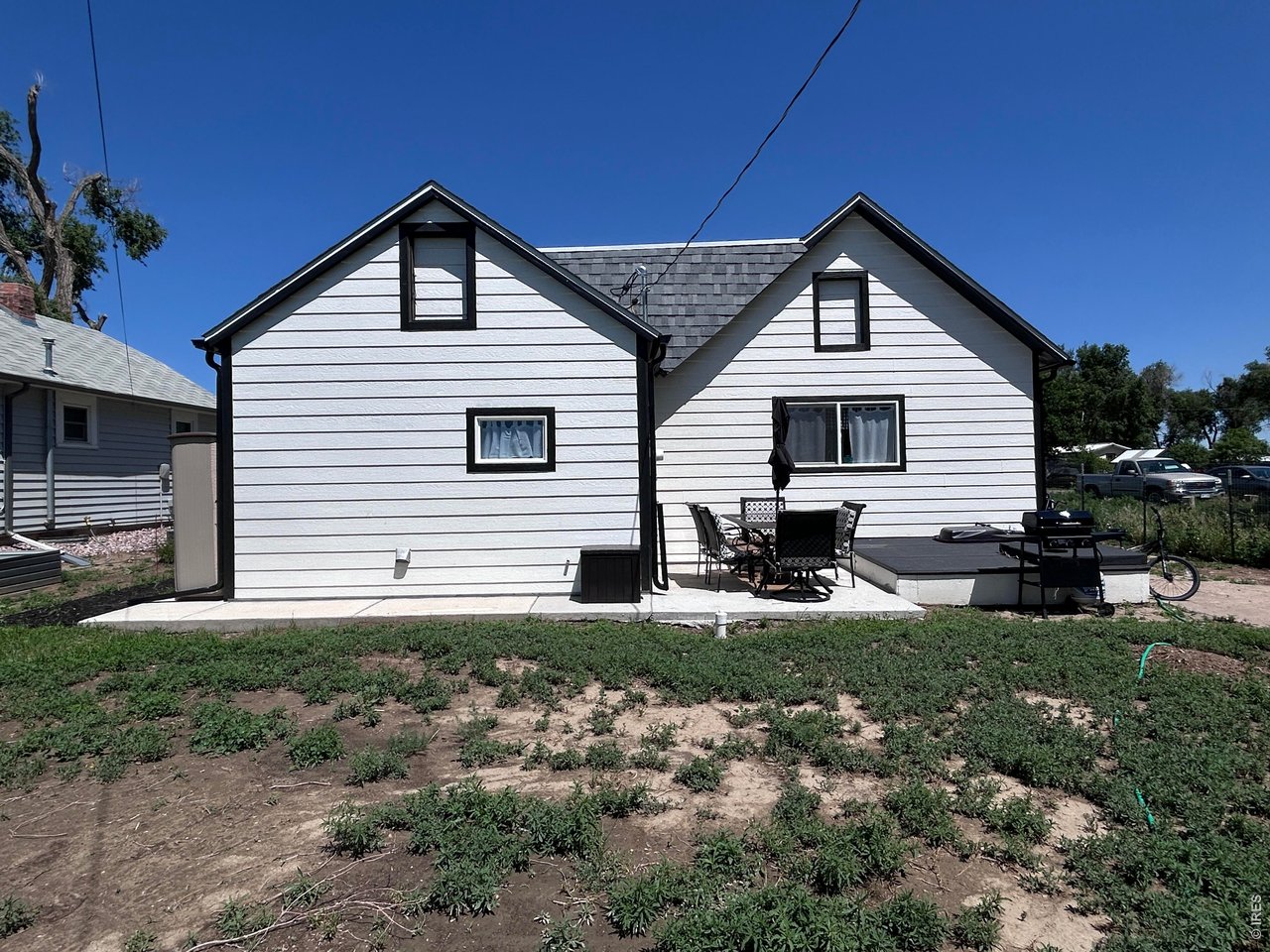 809 Warren Street Weldona, CO 80653 - Photo 14 of 19 a front view of a house with a yard