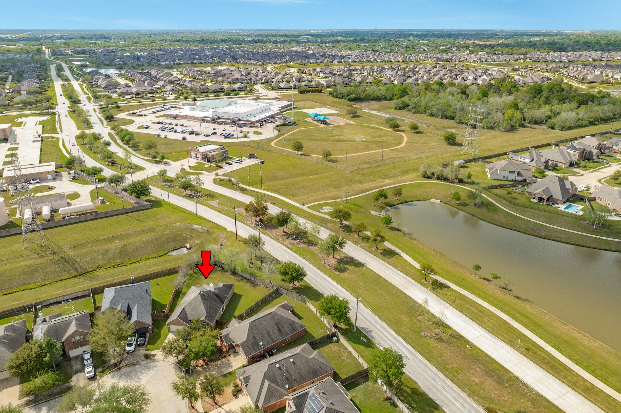 13417 Star Creek Lane Rosharon, TX 77583 - Photo 38 of 41 Aerial view showcasing the elementary school and Lakes of Savannah Road, the main access point in and out of the subdivision.